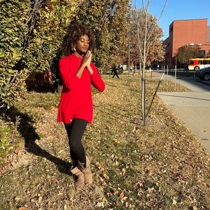 Red long sleeved blouse with  button low turtleneck neck